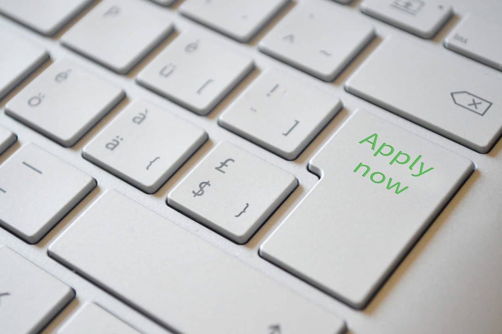 Keyboard with a green “Apply now” key